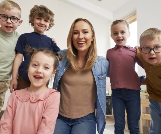Portrait of preschool children and their teacher